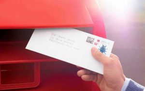 photo-priority-letters-hand-posting-in-box.jpg.auspostimage.970-0.low