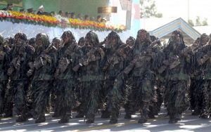 Members of the Iranian Army march during a parade marking the anniversary of the Iran-Iraq war (1980-88), in Tehran