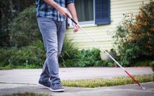 Well,Dressed,,Independent,Blind,Man,With,A,Long,White,Cane
