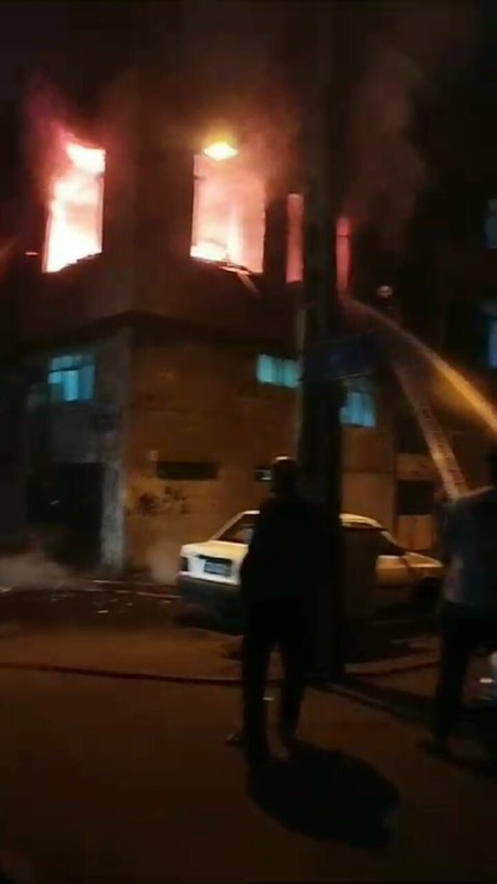 نجات یک زن از میان حریق 