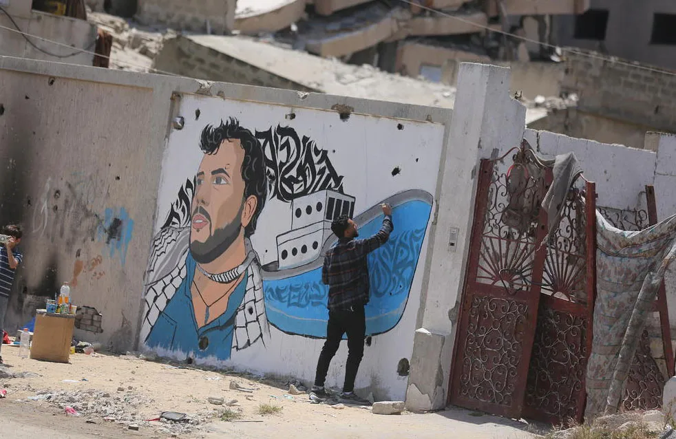 هنرمند غزه ای تصویر فعال برزیلی حامی فلسطین